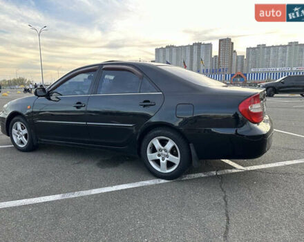 Черный Тойота Камри, объемом двигателя 2.4 л и пробегом 315 тыс. км за 5800 $, фото 11 на Automoto.ua