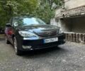Черный Тойота Камри, объемом двигателя 2.36 л и пробегом 302 тыс. км за 6500 $, фото 1 на Automoto.ua