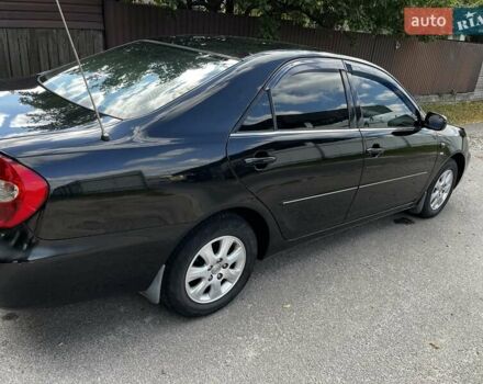 Черный Тойота Камри, объемом двигателя 2.37 л и пробегом 437 тыс. км за 6400 $, фото 28 на Automoto.ua