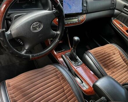 Черный Тойота Камри, объемом двигателя 2.37 л и пробегом 437 тыс. км за 6400 $, фото 21 на Automoto.ua