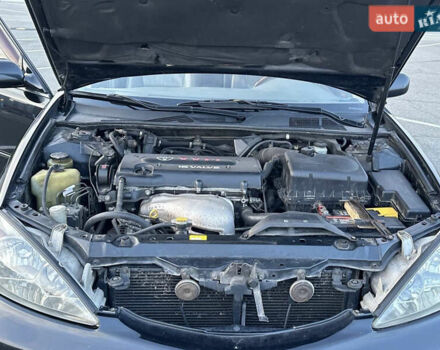 Черный Тойота Камри, объемом двигателя 2.4 л и пробегом 315 тыс. км за 5800 $, фото 16 на Automoto.ua