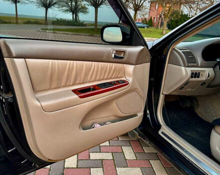 Черный Тойота Камри, объемом двигателя 3 л и пробегом 285 тыс. км за 6500 $, фото 9 на Automoto.ua