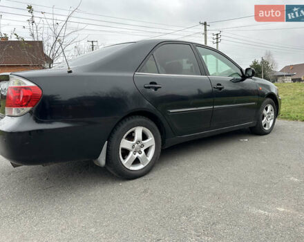 Черный Тойота Камри, объемом двигателя 2.4 л и пробегом 553 тыс. км за 5100 $, фото 4 на Automoto.ua