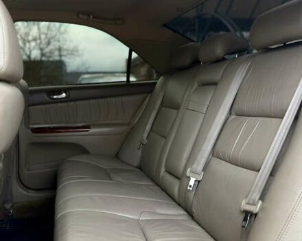 Чорний Тойота Камрі, об'ємом двигуна 3 л та пробігом 203 тис. км за 3999 $, фото 23 на Automoto.ua