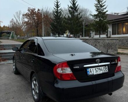 Черный Тойота Камри, объемом двигателя 2.4 л и пробегом 570 тыс. км за 6199 $, фото 2 на Automoto.ua