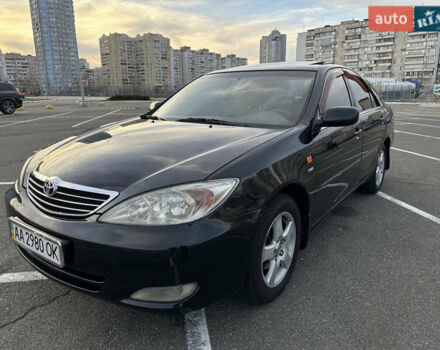 Черный Тойота Камри, объемом двигателя 2.4 л и пробегом 315 тыс. км за 5800 $, фото 9 на Automoto.ua