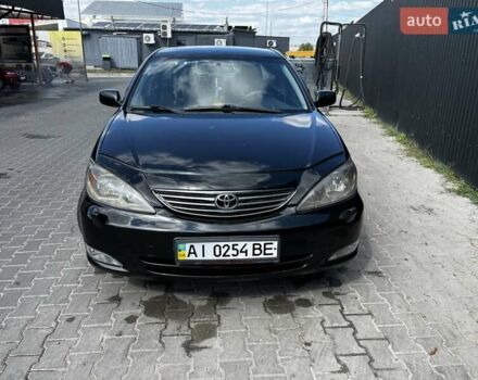 Черный Тойота Камри, объемом двигателя 2.37 л и пробегом 437 тыс. км за 6400 $, фото 3 на Automoto.ua