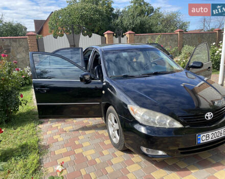 Чорний Тойота Камрі, об'ємом двигуна 3 л та пробігом 370 тис. км за 4999 $, фото 1 на Automoto.ua