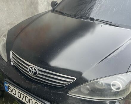 Черный Тойота Камри, объемом двигателя 3 л и пробегом 200 тыс. км за 6000 $, фото 1 на Automoto.ua