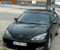 Черный Тойота Камри, объемом двигателя 2.36 л и пробегом 290 тыс. км за 4600 $, фото 1 на Automoto.ua
