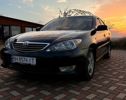 Черный Тойота Камри, объемом двигателя 3 л и пробегом 285 тыс. км за 6500 $, фото 1 на Automoto.ua