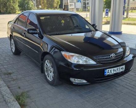 Чорний Тойота Камрі, об'ємом двигуна 2.36 л та пробігом 320 тис. км за 4700 $, фото 2 на Automoto.ua