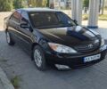 Чорний Тойота Камрі, об'ємом двигуна 2.36 л та пробігом 320 тис. км за 4700 $, фото 2 на Automoto.ua