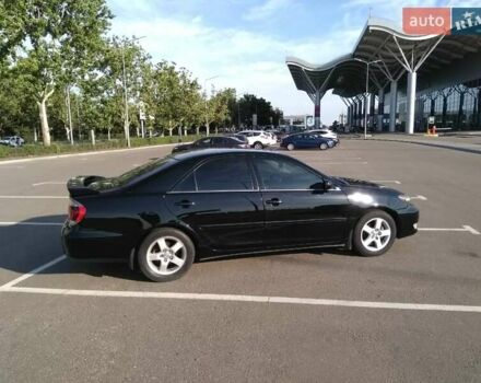 Черный Тойота Камри, объемом двигателя 2.36 л и пробегом 390 тыс. км за 6800 $, фото 2 на Automoto.ua