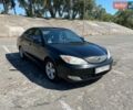 Черный Тойота Камри, объемом двигателя 2.36 л и пробегом 450 тыс. км за 4200 $, фото 1 на Automoto.ua