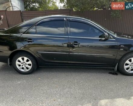 Черный Тойота Камри, объемом двигателя 2.37 л и пробегом 437 тыс. км за 6400 $, фото 29 на Automoto.ua