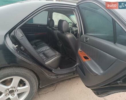 Черный Тойота Камри, объемом двигателя 3 л и пробегом 370 тыс. км за 4500 $, фото 12 на Automoto.ua