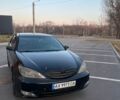 Чорний Тойота Камрі, об'ємом двигуна 2.36 л та пробігом 350 тис. км за 5400 $, фото 1 на Automoto.ua