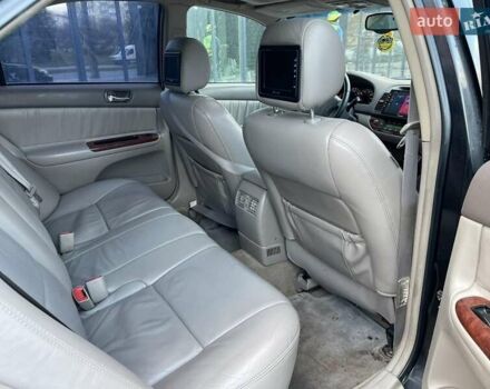 Черный Тойота Камри, объемом двигателя 3 л и пробегом 300 тыс. км за 4400 $, фото 16 на Automoto.ua