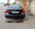 Черный Тойота Камри, объемом двигателя 2.37 л и пробегом 300 тыс. км за 1000 $, фото 1 на Automoto.ua