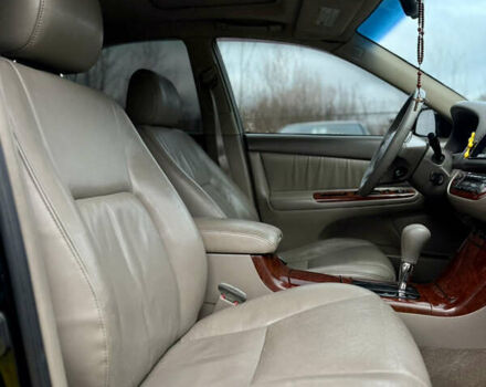 Чорний Тойота Камрі, об'ємом двигуна 3 л та пробігом 203 тис. км за 3999 $, фото 15 на Automoto.ua