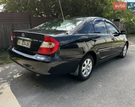 Черный Тойота Камри, объемом двигателя 2.37 л и пробегом 437 тыс. км за 6400 $, фото 12 на Automoto.ua