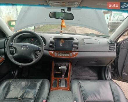 Черный Тойота Камри, объемом двигателя 3 л и пробегом 370 тыс. км за 4500 $, фото 14 на Automoto.ua