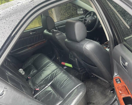 Черный Тойота Камри, объемом двигателя 3 л и пробегом 340 тыс. км за 6700 $, фото 7 на Automoto.ua