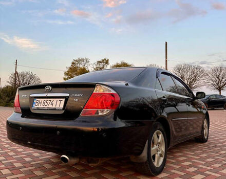 Черный Тойота Камри, объемом двигателя 3 л и пробегом 285 тыс. км за 6500 $, фото 5 на Automoto.ua