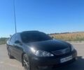 Чорний Тойота Камрі, об'ємом двигуна 2.4 л та пробігом 240 тис. км за 6200 $, фото 1 на Automoto.ua