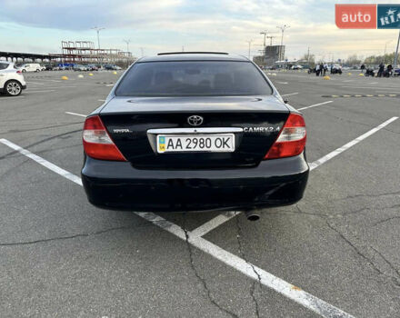 Черный Тойота Камри, объемом двигателя 2.4 л и пробегом 315 тыс. км за 5800 $, фото 4 на Automoto.ua
