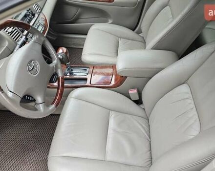 Тойота Камри 2004 в Каменское - Днепродзержинск на Automoto.ua Черный Тойота Камри, объемом двигателя 2 л и пробегом 180 тыс. км за 6700 $, фото 8 на Automoto.ua