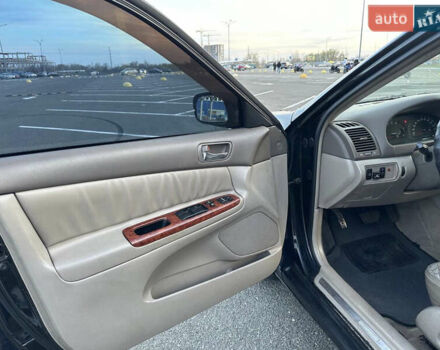 Черный Тойота Камри, объемом двигателя 2.4 л и пробегом 315 тыс. км за 5800 $, фото 12 на Automoto.ua