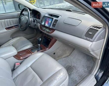 Черный Тойота Камри, объемом двигателя 3 л и пробегом 300 тыс. км за 4400 $, фото 15 на Automoto.ua