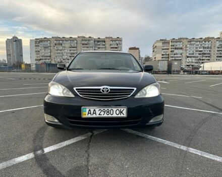 Черный Тойота Камри, объемом двигателя 2.4 л и пробегом 313 тыс. км за 5800 $, фото 1 на Automoto.ua