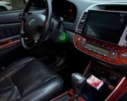 Черный Тойота Камри, объемом двигателя 2.4 л и пробегом 570 тыс. км за 6199 $, фото 6 на Automoto.ua