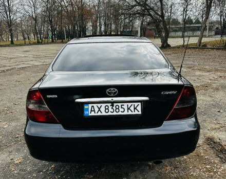 Черный Тойота Камри, объемом двигателя 3 л и пробегом 301 тыс. км за 4500 $, фото 4 на Automoto.ua