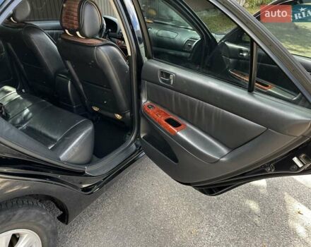 Черный Тойота Камри, объемом двигателя 2.37 л и пробегом 437 тыс. км за 6400 $, фото 26 на Automoto.ua