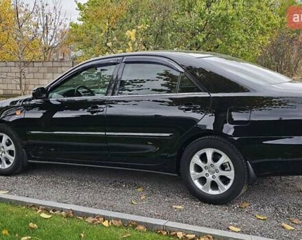 Тойота Камри 2004 в Каменское - Днепродзержинск на Automoto.ua Черный Тойота Камри, объемом двигателя 2 л и пробегом 180 тыс. км за 6700 $, фото 5 на Automoto.ua