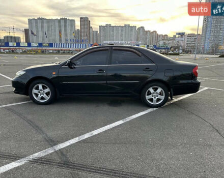 Черный Тойота Камри, объемом двигателя 2.4 л и пробегом 315 тыс. км за 5800 $, фото 7 на Automoto.ua