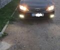 Черный Тойота Камри, объемом двигателя 2.4 л и пробегом 305 тыс. км за 6052 $, фото 1 на Automoto.ua