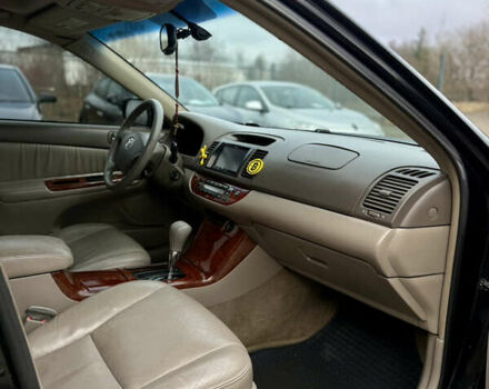 Чорний Тойота Камрі, об'ємом двигуна 3 л та пробігом 203 тис. км за 3999 $, фото 14 на Automoto.ua