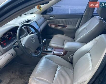 Черный Тойота Камри, объемом двигателя 3 л и пробегом 300 тыс. км за 4400 $, фото 11 на Automoto.ua