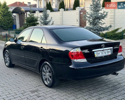 Черный Тойота Камри, объемом двигателя 2.36 л и пробегом 98 тыс. км за 8700 $, фото 12 на Automoto.ua