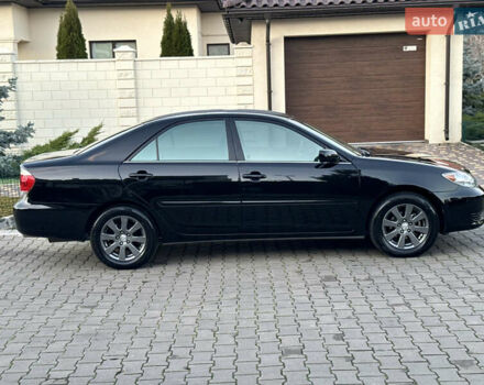 Черный Тойота Камри, объемом двигателя 2.36 л и пробегом 98 тыс. км за 8700 $, фото 24 на Automoto.ua