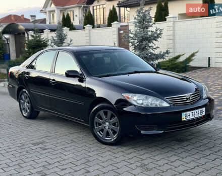 Черный Тойота Камри, объемом двигателя 2.36 л и пробегом 98 тыс. км за 8700 $, фото 32 на Automoto.ua