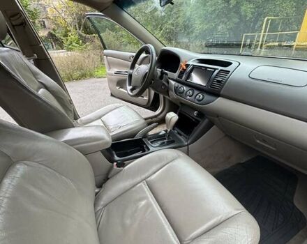 Чорний Тойота Камрі, об'ємом двигуна 2.36 л та пробігом 180 тис. км за 6000 $, фото 9 на Automoto.ua