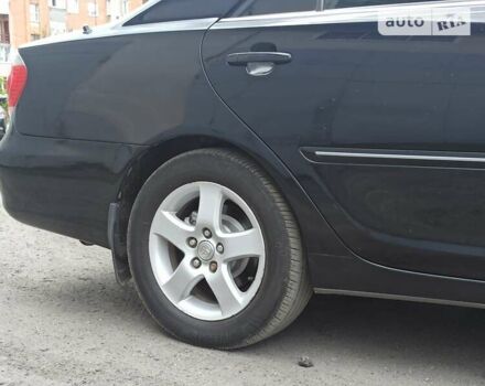 Черный Тойота Камри, объемом двигателя 2.4 л и пробегом 284 тыс. км за 6700 $, фото 10 на Automoto.ua