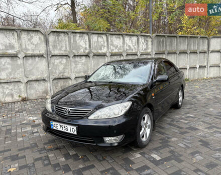 Черный Тойота Камри, объемом двигателя 2.4 л и пробегом 326 тыс. км за 6300 $, фото 1 на Automoto.ua