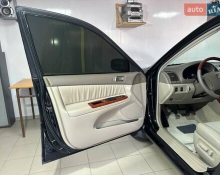 Черный Тойота Камри, объемом двигателя 2.36 л и пробегом 253 тыс. км за 6900 $, фото 35 на Automoto.ua